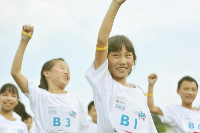 A group of young racers from Shanghai put their hands up for child survival